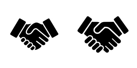 Obraz premium Handshake of Agreement: Two Business Partners Sealing a Deal in Black and White