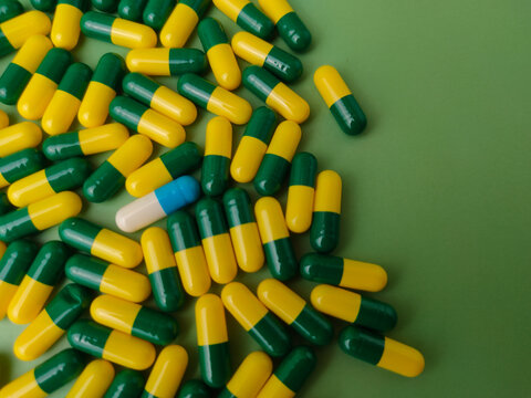Yellow and green capsules, which are commonly associated with the medication Tramadol in 50 mg doses