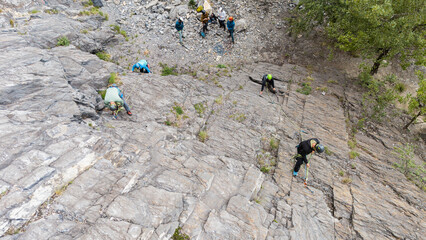A group of rock climbers during a climbing course in Switzerland.