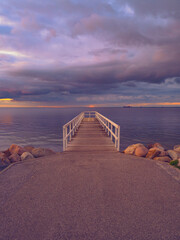 Fototapeta premium wooden pier on the sea on sunset time
