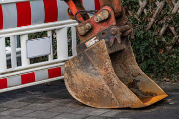 Heavy excavator bucket at construction site in urban area © Viktor