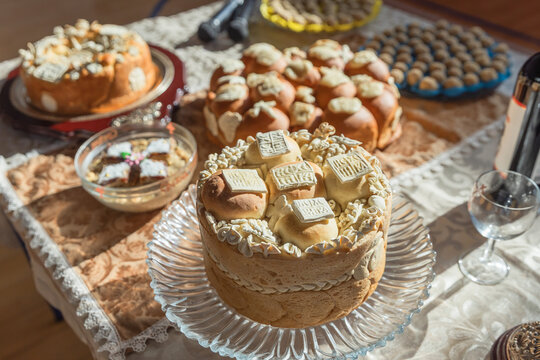 Traditional Orthodox Slava bread decorated with religious dough symbols.
