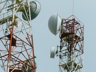 Telecommunication Towers Against Blue Sky