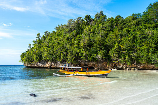 Traditional boat on Lia beach, Waleakodi Island, Togian archipelago, Sulawesi, Indonesia