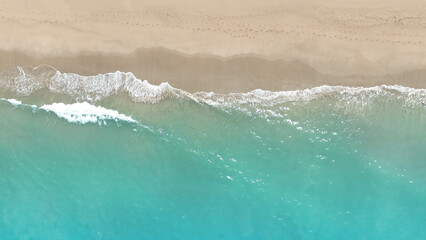Aerial View of Turquoise Shoreline in a tropical Beach waves and Ocean