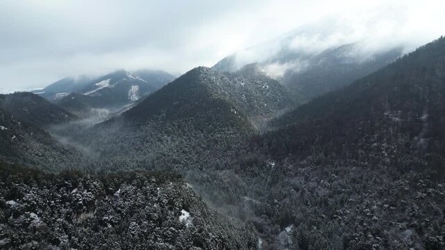 Aerial view of Blatnica Valley in Velka Fatra mountains in Slovakia, winter landscape, 4K, ProRes