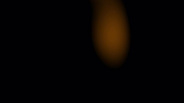Warm amber abstract light leaks flashing on black background for retro film overlay
