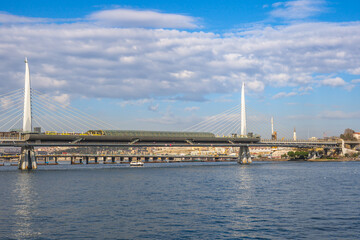 Fototapeta premium Golden Horn Metro Bridge under cloudy sky
