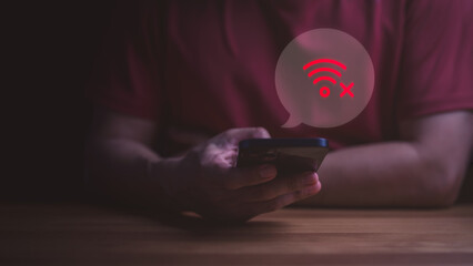 Man holding smartphone with no wifi icon. Concept of internet connection error, offline status,...