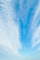 Evening blue sky background, cumulus clouds in the blue sky