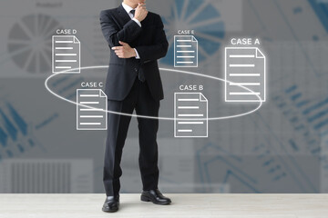 レポートを見てケーススタディーを行うビジネスマン