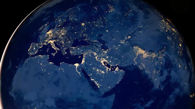 Planet Earth night view zoom in on Europe and Middle East from space. Cinematic satellite footage of glowing city lights and urban networks. Elements of this image furnished by NASA.
