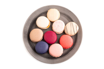 Obraz premium Macarons colourful cookies dessert isolated on white, close up, top view