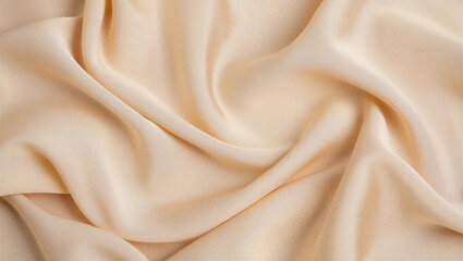 Fototapeta premium Soft peach colored fabric with smooth folds and gentle draping