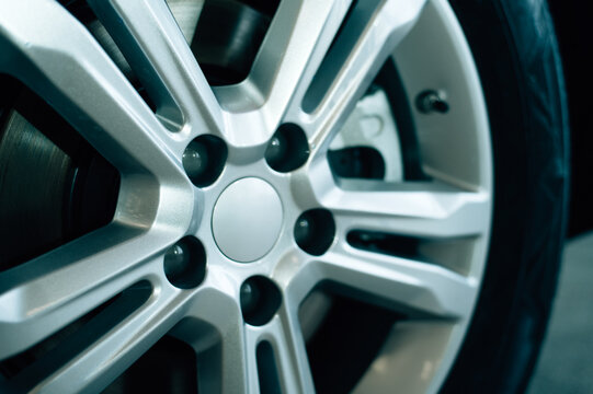 Modern car wheel close-up. Winter tires.