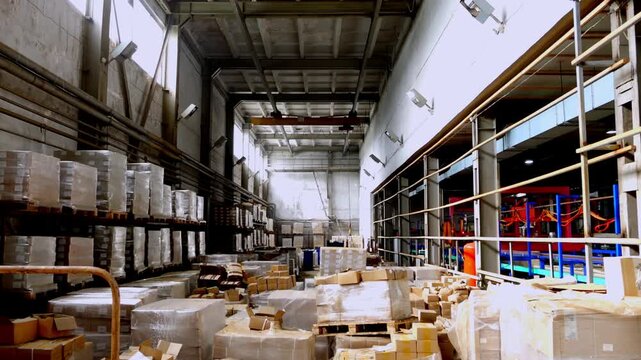 Overhead View of Disorganized Industrial Warehouse Interior with Palletized Goods