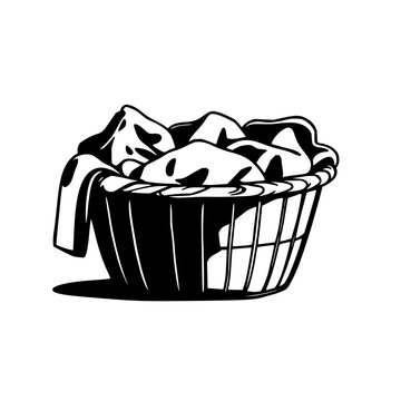 Elegant black silhouette of a laundry basket filled with soft fabric shapes, perfect for interior design, home d&eacute;cor, or washing care visuals
