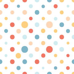 Colorful polka dot pattern on white background.