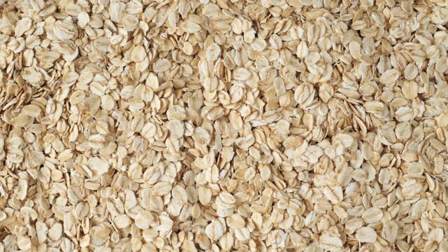 Rolled oats cereal falling for healthy breakfast.