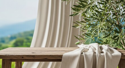 Fototapeta premium Rustic wooden table and organic linen cloth create a serene backdrop with a lush olive tree for natural product display