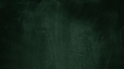 Green chalkboard texture with subtle chalk dust and worn surface. Classic school blackboard background ideal for education designs, menus, typography, posters and mockups. © The Stock King