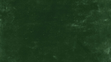 Green chalkboard texture with subtle chalk dust and worn surface. Classic school blackboard background ideal for education designs, menus, typography, posters and mockups. © The Stock King
