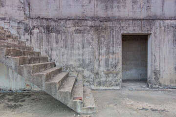 Concrete stairs in an old building.