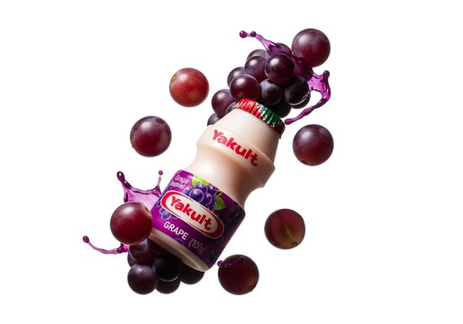Yakult Grape Flavor Probiotic Drink with Fresh Grapes Splash.