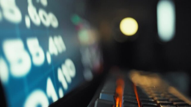 Trader intently studies a glowing monitor displaying a stream of stock market ticker data, including forex pairs and indices, as rapidly changing prices and charts reflect the pulse of global finance