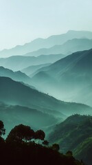 Misty mountains with a serene and tranquil atmosphere in the early morning light