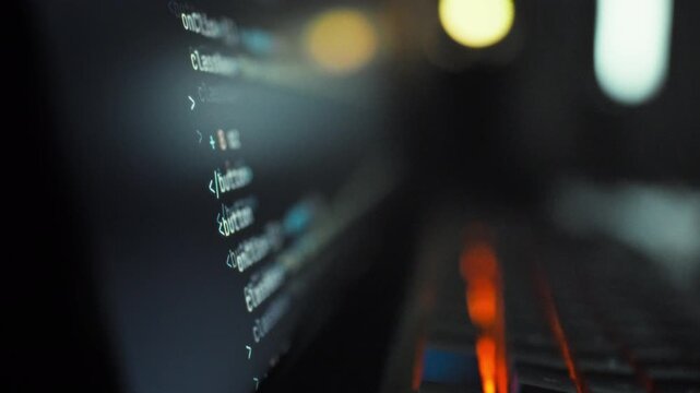 A developer observes AI-driven code generation on a computer screen as the artificial intelligence model autonomously creates software algorithms, exemplifying automation in programming
