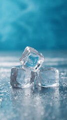 Three clear ice cubes stacked on a reflective blue surface with a blurred background