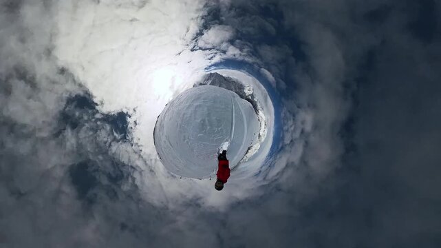 A snowboarder riding down a mountainside. Freeride, powder, white slopes, a winter atmosphere. Snowboard, sports equipment. Real people. MegaView. UltraWid. ActionView. Tiny Planet