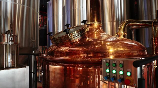 Stainless steel brewery equipment with copper fermentation tank for craft beer.