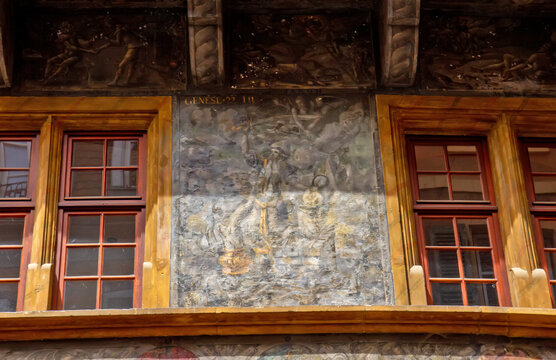 Famous Renaissance Maison Pfister with painted facade and wooden balcony dominating a historic Colmar street corner.