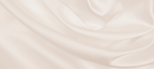Smooth elegant golden silk or satin luxury cloth texture as wedding background. Luxurious...