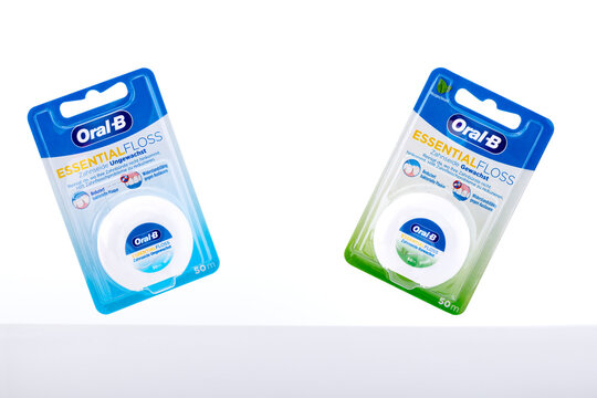 Oral-B Essential Floss 50m Dental Floss in Retail Blister Packaging &ndash; Waxed and Unwaxed Zahnseide Store Display, Illustrative Editorial