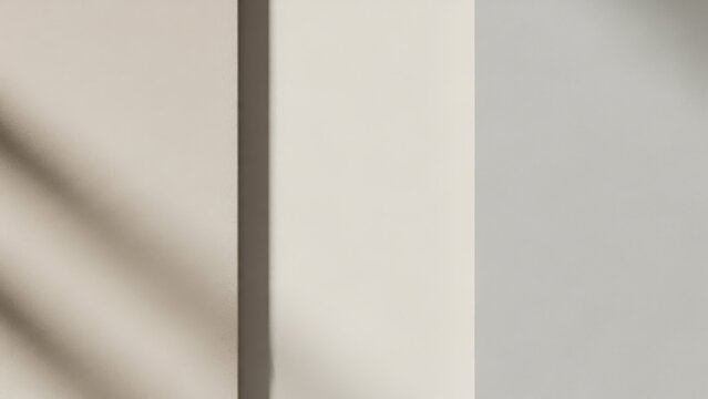 Softly lit cream and beige wall panels with subtle shadow creating a minimalist abstract backdrop