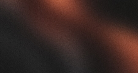 Warm copper light beam shining across dark background copy space with heavy grainy noise texture.