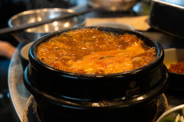 boiling doenjang jjigye, a traditonal Korean stew