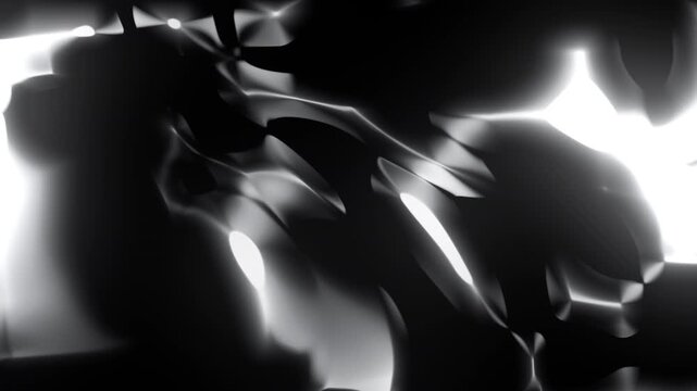 Metallic monochrome abstract fluid shapes with bright reflections on black background. Loop animation.