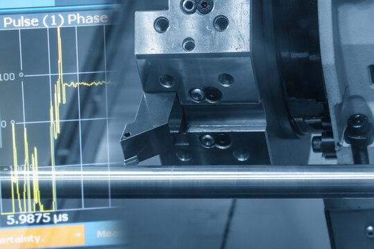 Abstract CNC Lathe Turning of Metal Shaft with Graph Background