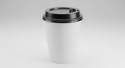 White paper cup with black lid stands on a light gray background.