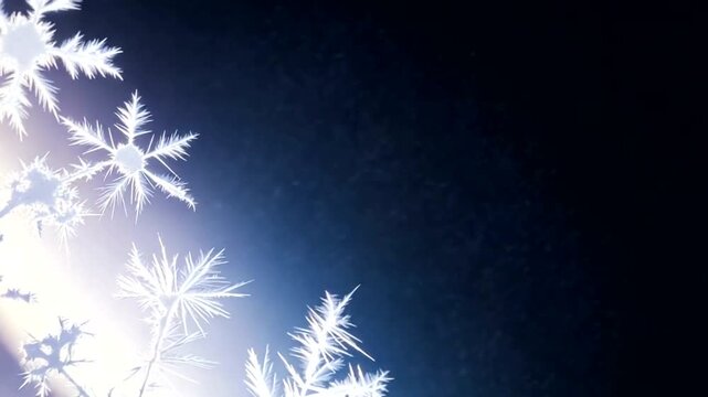Snowflakes Falling Against Dark Blue Background.