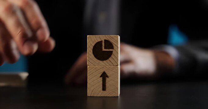 Wooden Block with Growth Chart and Business Progress Concept