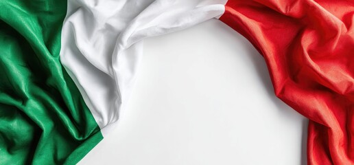 Italian flag draped over white surface, with green on left and red on right