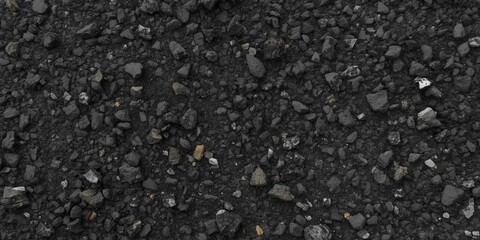 Dark gravel texture background, rough stone surface, natural abstract pattern.