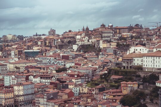 Experience the stunning cityscape of Porto with its charming terracotta rooftops and intricate azulejos tiles. The lively atmosphere captures the essence of traditional Portuguese culture