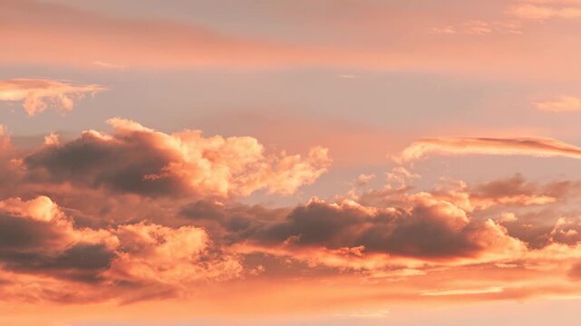 Muted sunset palette with dusty rose and burnt orange sky layered clouds minimal foreground calm composition evening glow