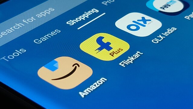 Popular e-commerce apps icons on smartphone screen